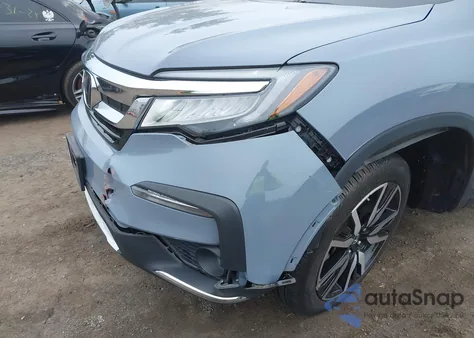 2022 Honda Pilot Touring z USA, uszkodzony, nr VIN 5FNYF6H68NB056077